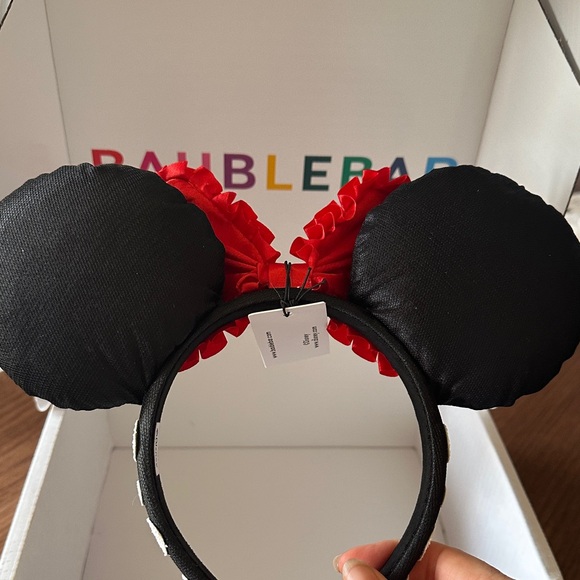 Bauble Bar Disney Black and White Polka Dot Minnie Ears with Red Bow - Picture 4 of 4